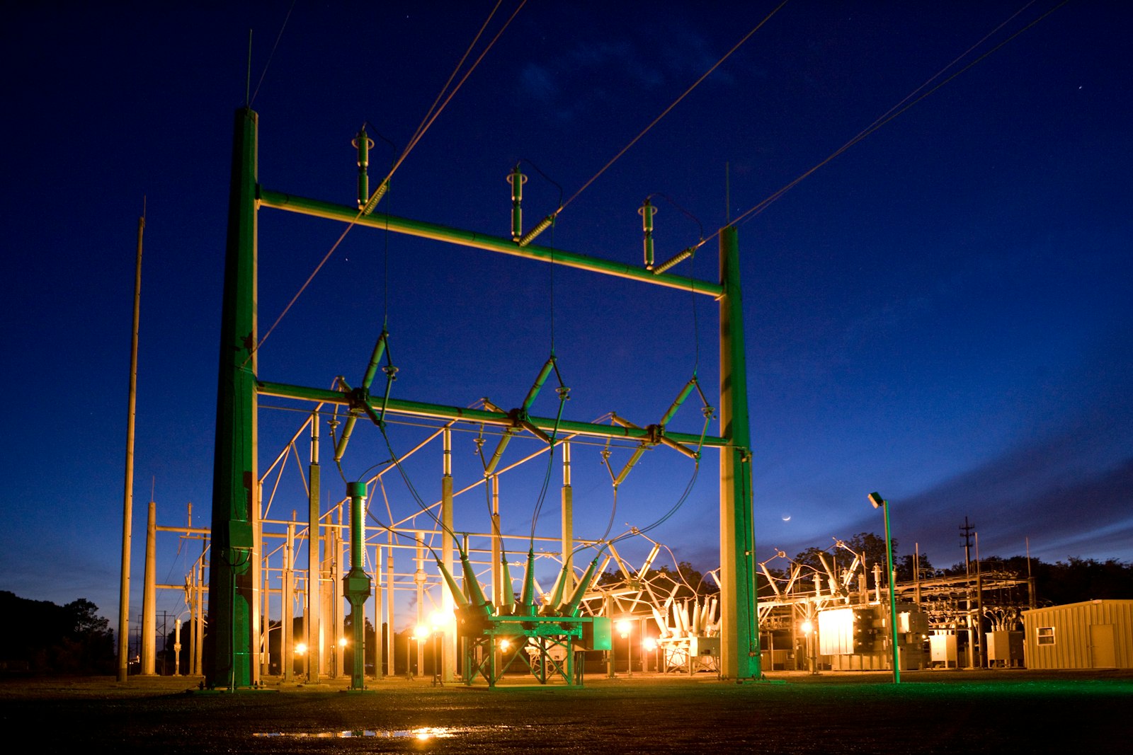High voltage substation infrastructure at dusk